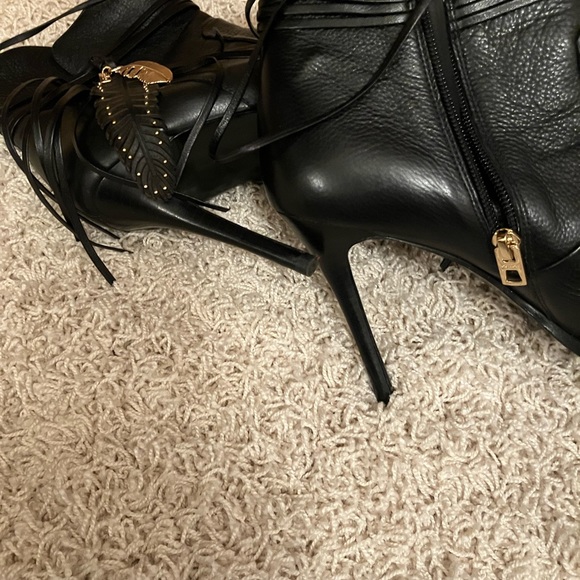 Rare find Coach boots with hanging feather and fringes . Heel is approx 4 inches - Picture 2 of 2